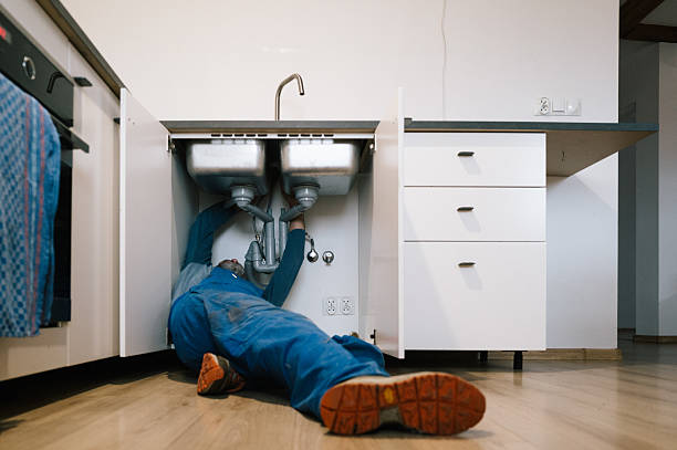 Professional Drain Cleaning technician working in Davis, WV